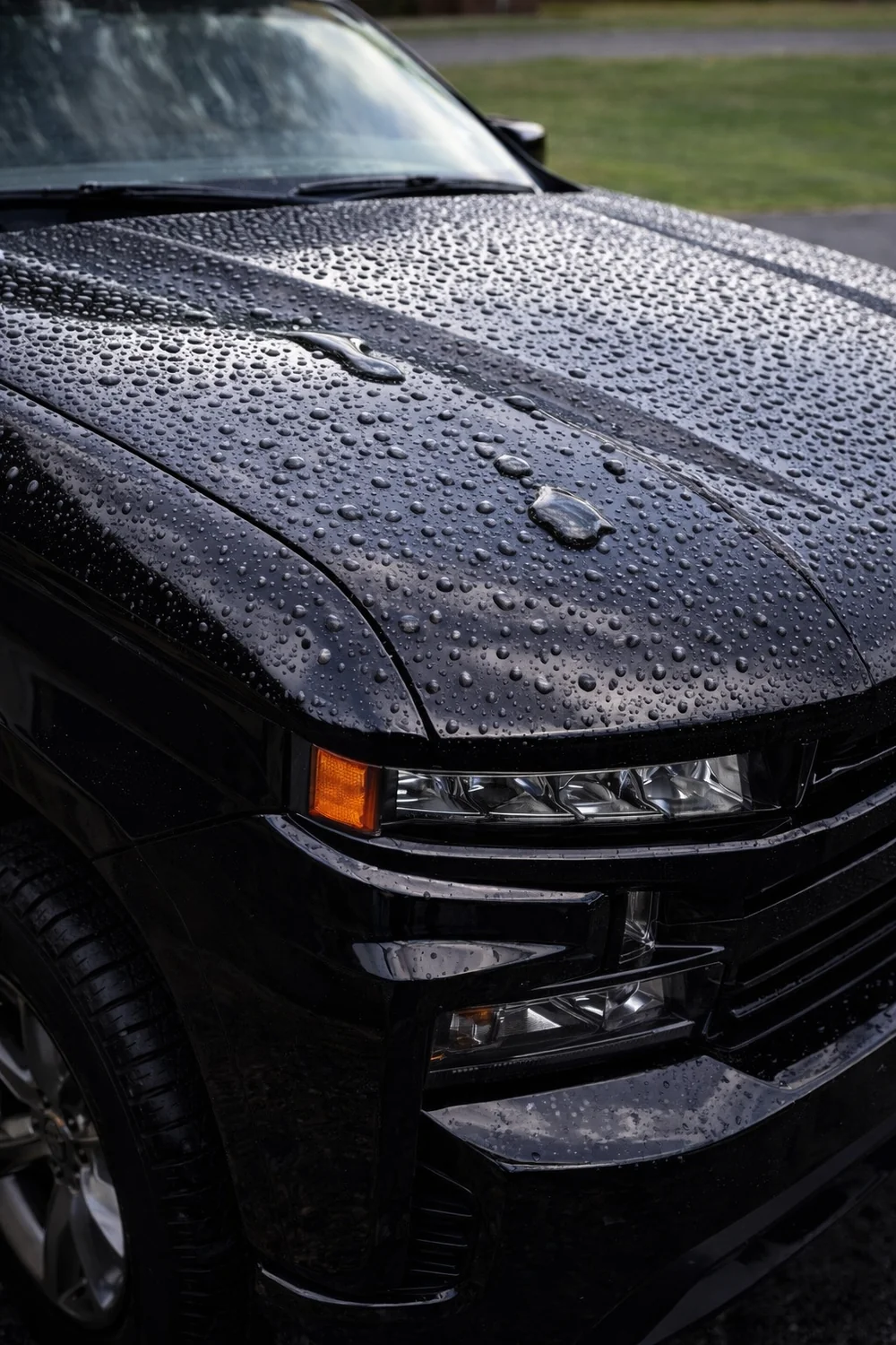 Water beading on ceramic-coated GMC Sierra hood